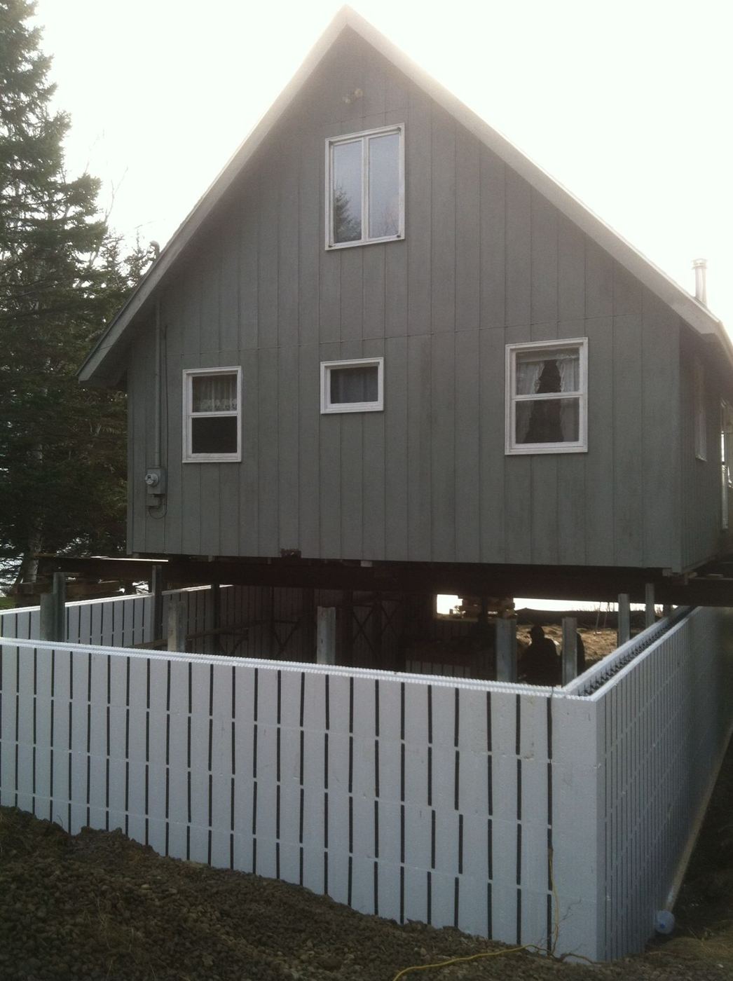 ICF foundation walls built under the raised gray camp